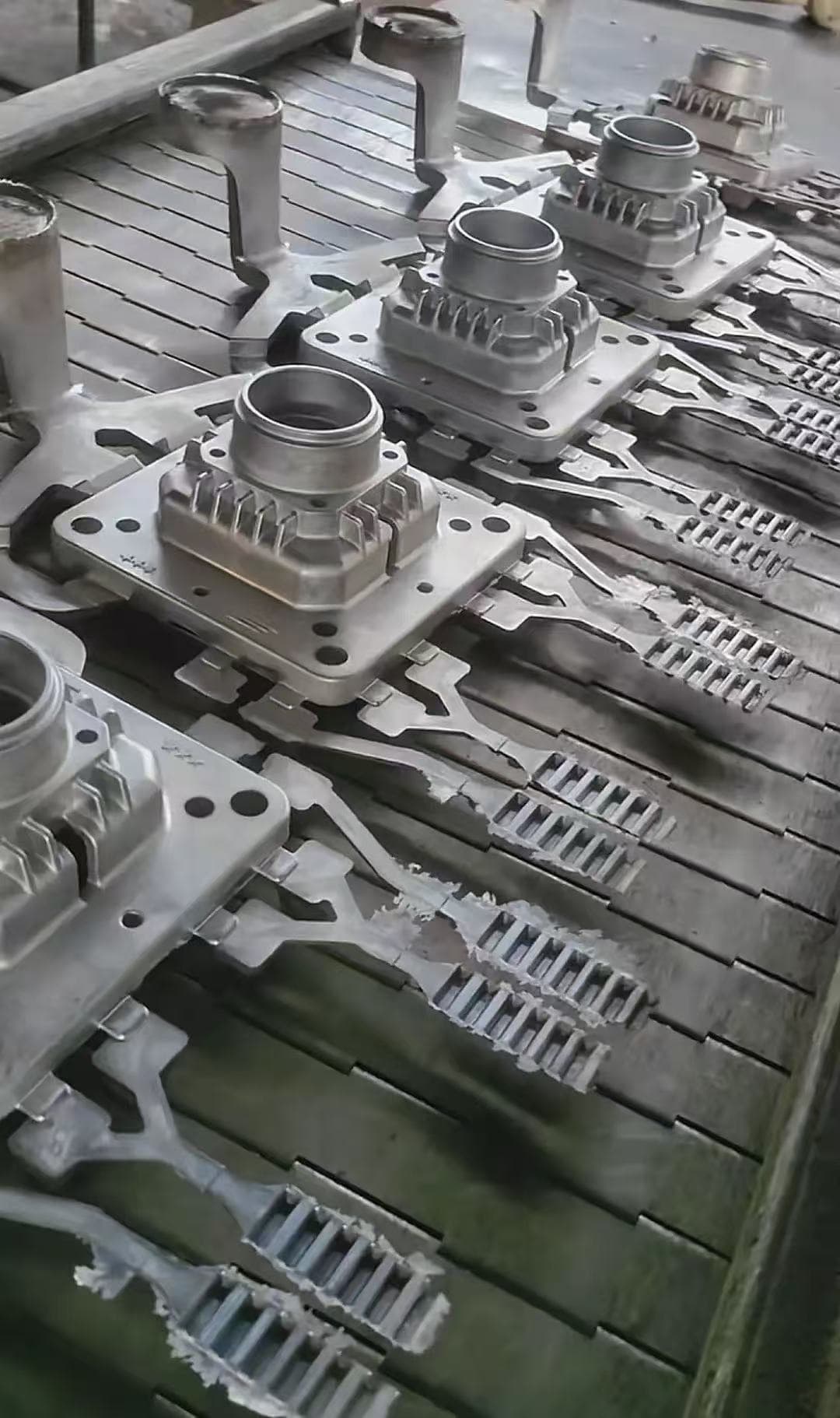 Batch aluminum die-cast parts before trimming and finishing